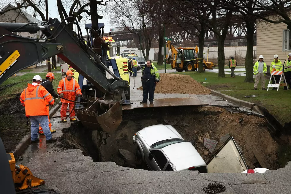 Sinkhole Swallows Three Cars On South Side Of Chicago